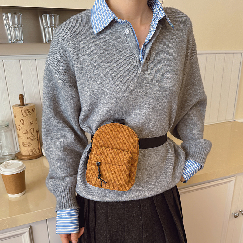 Otoño y invierno nuevo tipo de tela de seda para niños bolsa de pecho deportiva de ocio de viaje ligero bolso de cintura para niños de color sólido coreano bolso de cintura