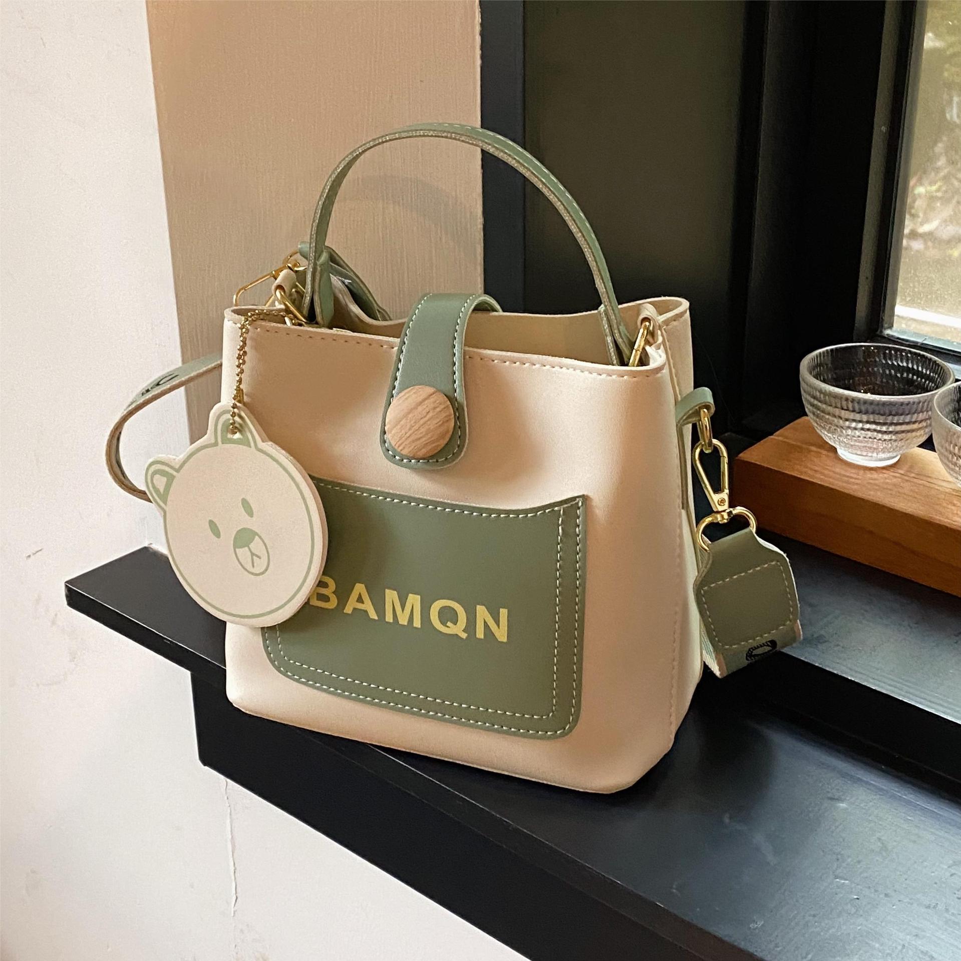 Diseño de nicho bolso a juego para mujeres 2023 nuevo popular bolsa de cubo bolsa de mensajero portátil de celebridades en línea de alta calidad