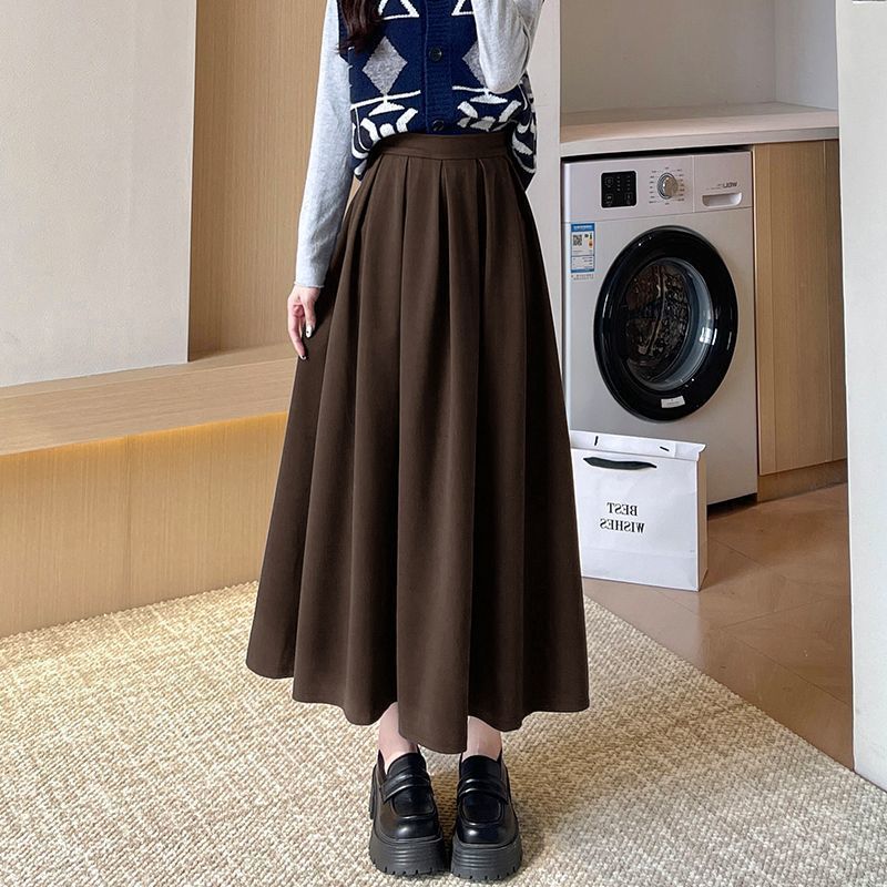 H 8aの毛は百タックの半身のスカートの女性の中で長いタイプの秋冬の新型の高い腰はやせているa字のスカートの小さいサイズの傘のスカートを現します。|undefined