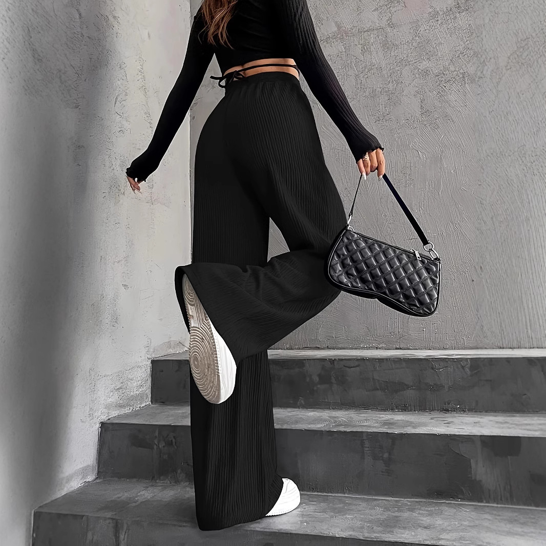 Pantalones largos informales de color liso para mujer, estilo europeo y americano, de corte cruzado, ideales para otoño e invierno de 2024._voghion.com