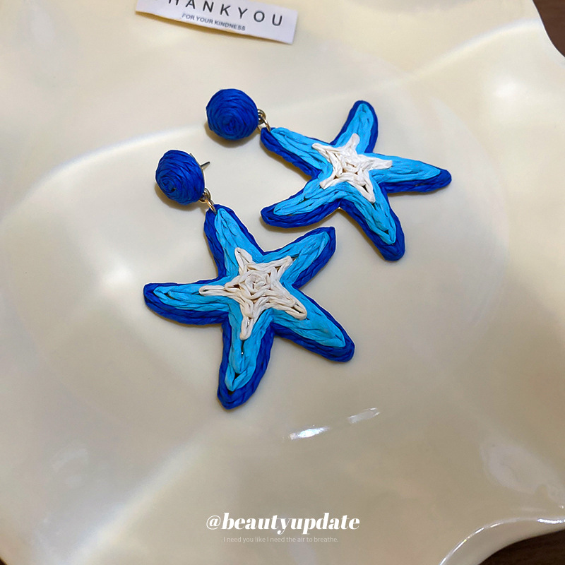 Pendientes de estrella de mar tejido de rafia Pendientes de estilo Semia Pendientes de moda Pendientes de todo fósforo Sensación de clase alta de nicho