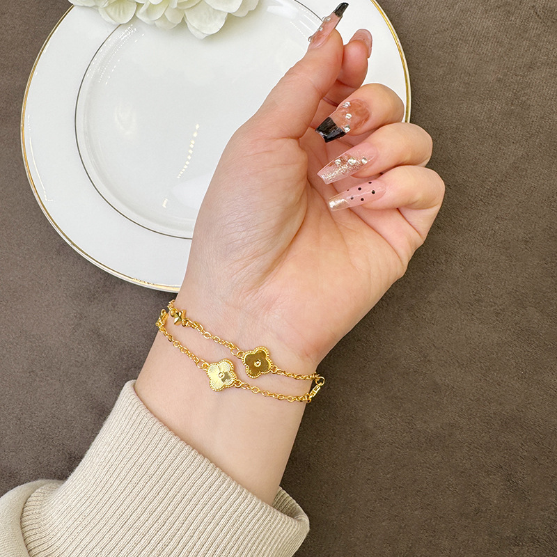 Nuevos productos de pulsera de oro de arena vietnamita corte viento láser de cuatro hojas de flores pulsera de moda mujer bronce chapado en oro joyas no se desvanecen