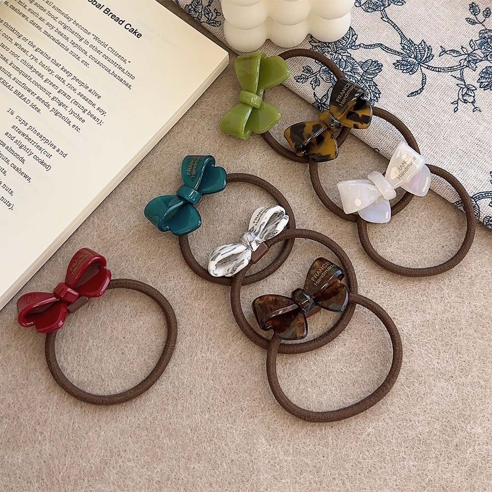 Coreano oro acético adorable arco de cabello anillo de cabello cuerda elástica cuerda de cabello duradera mujer