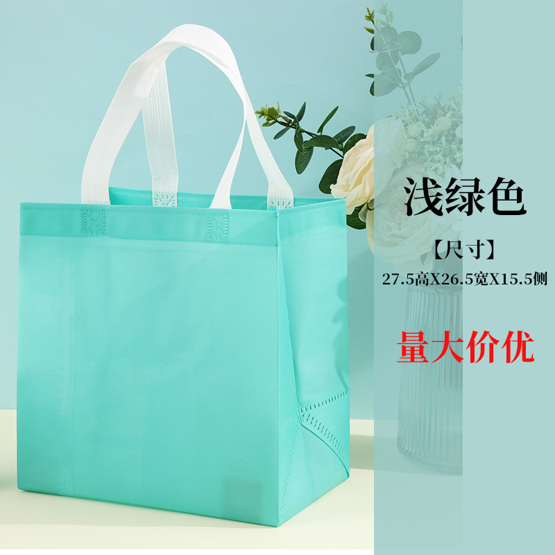 En stock bolso no tejido recubierto al por mayor bolsa de protección del medio ambiente bolsa de tienda de ropa bolso de compras engrosado logotipo imprimible