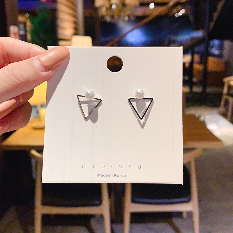 53 # Perla triangular