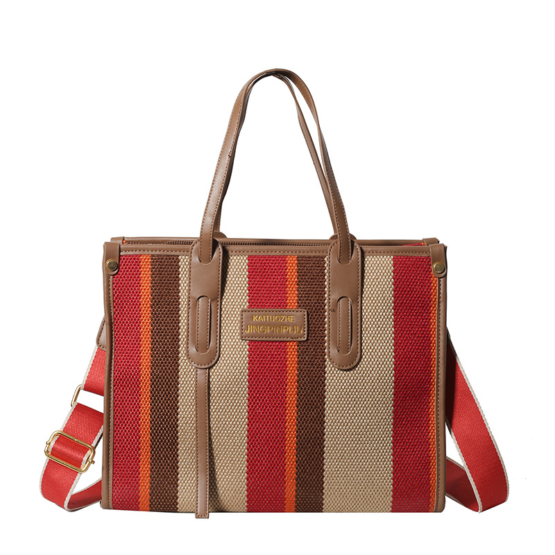 Bolso Tote portátil a rayas de color de contraste de lona para mujer 2024 nueva textura de moda transfronteriza bolso de mensajero de un solo hombro