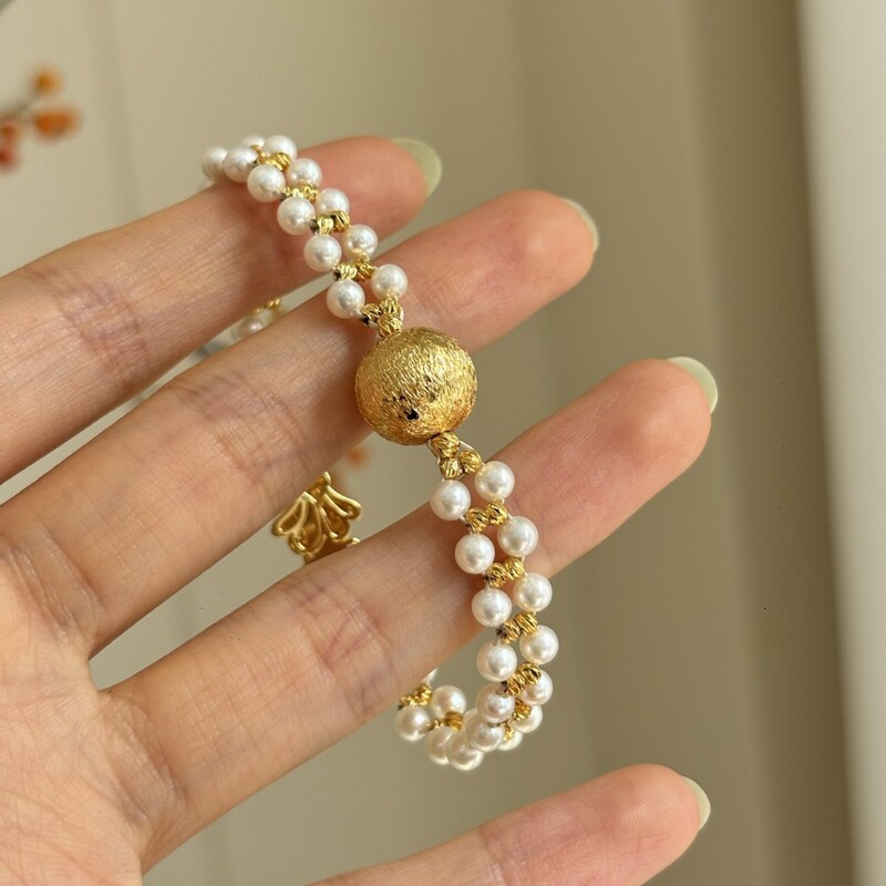 Zhuji Pearl Brushed Gold Ball Double-Layer Braided Bracelet with 3-4mm Freshwater Pearls, Near-Round Shape, Strong Luster Zhuji Pearl Brushed Gold Ball Double-Layer Braided Bracelet with 3-4mm Freshwater Pearls, Near-Round Shape, Strong Luster