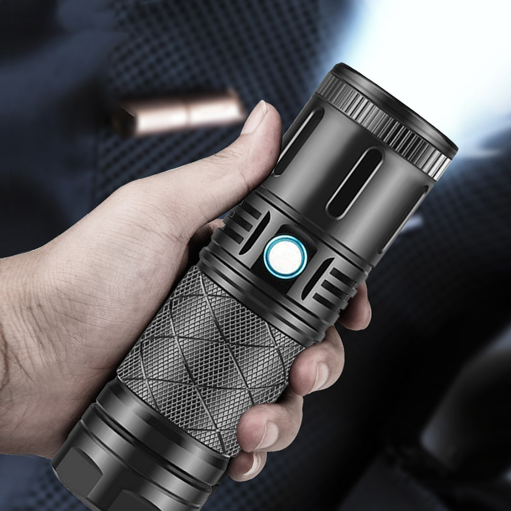 抖音热卖新款户外防水USB充电小钢炮白激光远射战术大功率手电筒