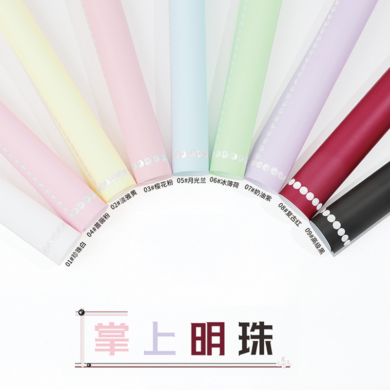 Huaxi fábrica de perlas de palma al por mayor de papel elegante puntos alrededor del borde impermeable perla envoltura material de embalaje de flores de papel