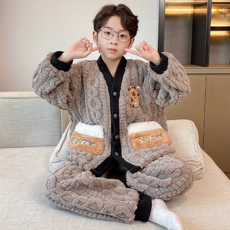 Pijamas de niños de invierno de nuevo estilo de mangas largas con cremallera de ropa cálida para el hogar simple para niños de tamaño medio y grande se pueden usar fuera