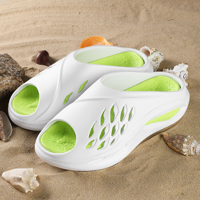 2025 verano nuevo coco Baotou Hole zapatos de tamaño grande playa de tamaño grande comercio exterior Eva pareja sandalias mayorista