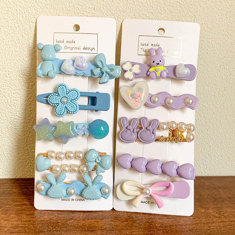 Ventas directas de fábrica 2025 nueva horquilla de color para mujer nueva pinza de flequillo lateral linda horquilla rota pinza de una palabra dulce