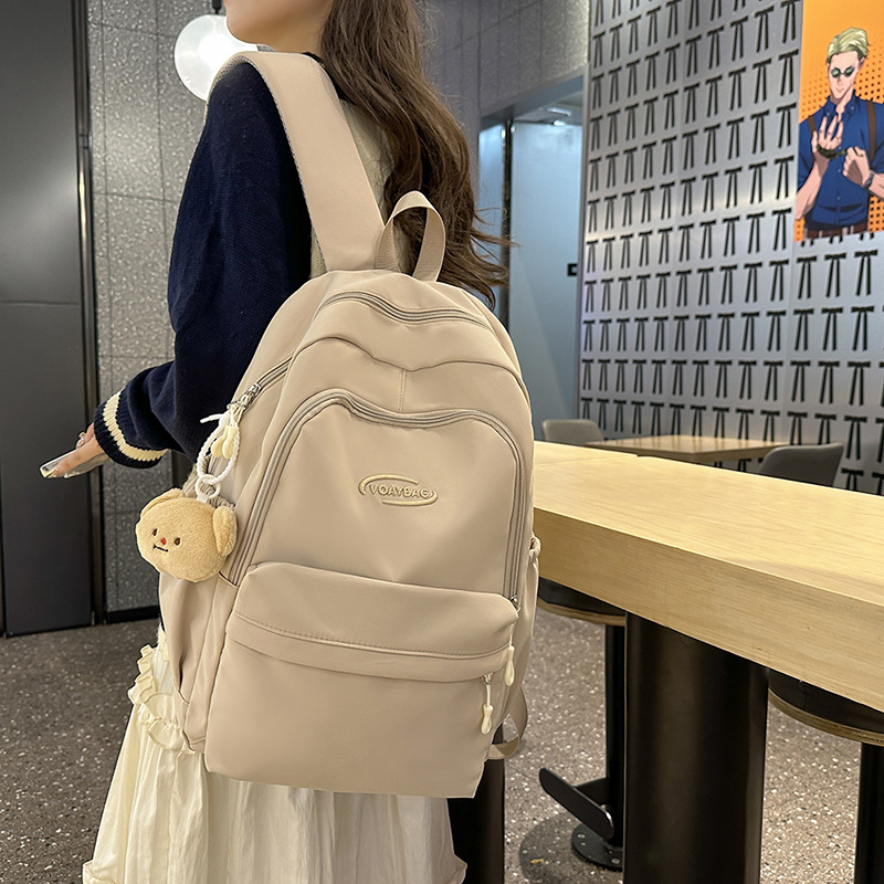 Las chicas japonesas INS son ligeras y sencillas con gran capacidad, y toman mochilas escolares. mochilas de viaje de hombro para estudiantes de secundaria y secundaria.