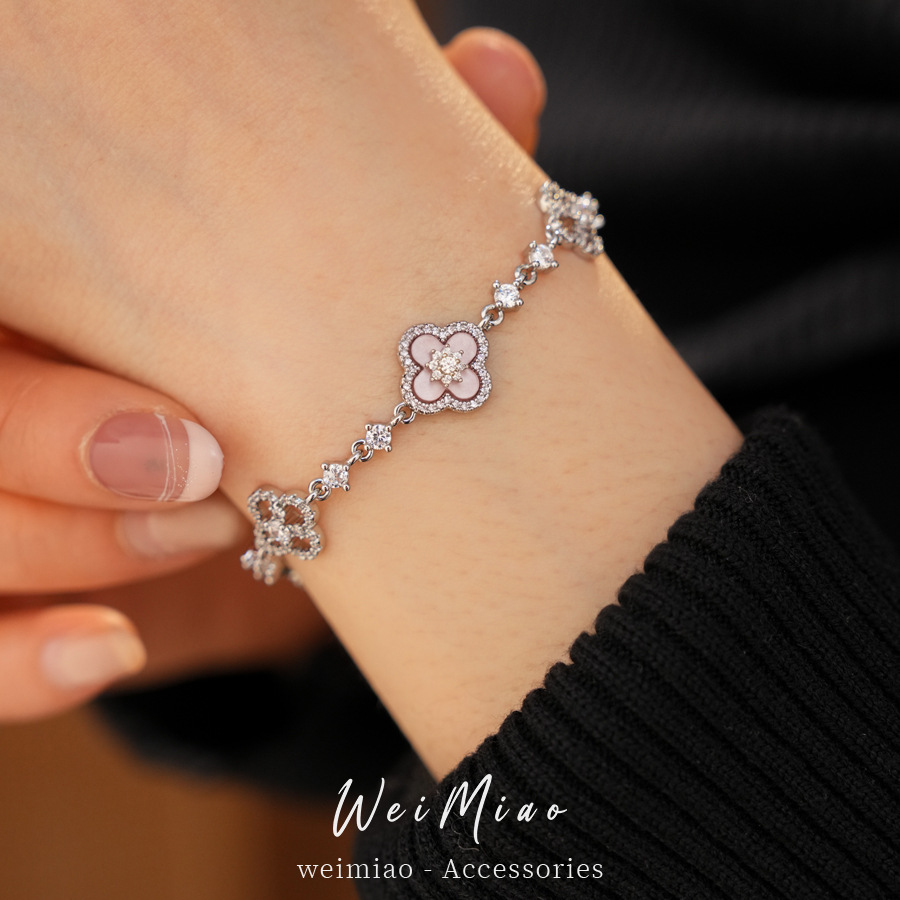 Exquisita variedad de diamantes de diamante flor hueco pulsera ligera de lujo pulsera alta sensación de moda moda joyas al por mayor