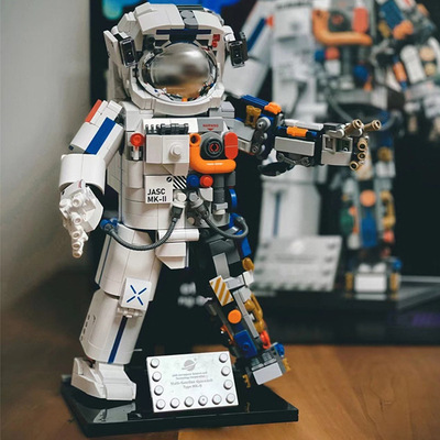 JAKI Jiaqi amanecer astronauta compatible Lego modelo de ladrillo niño desmontado astronauta chino regalo de decoración