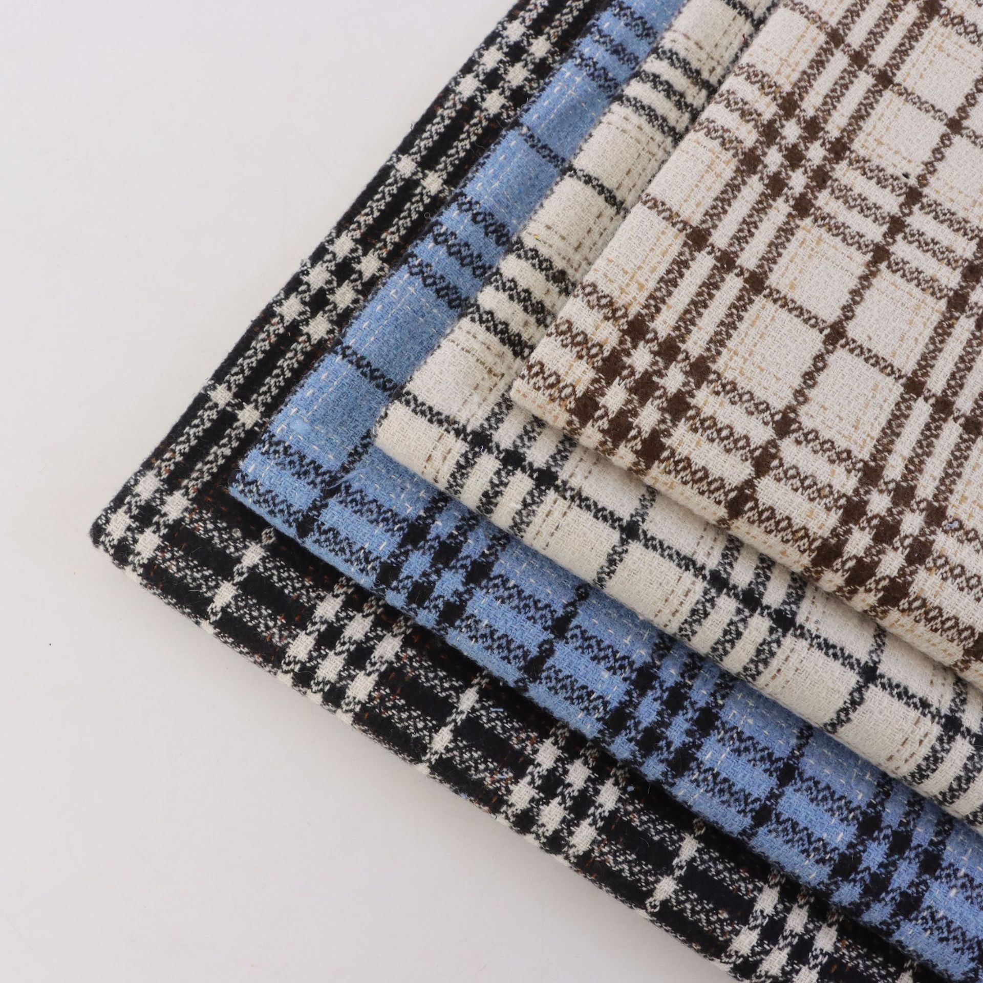 粗纺羊毛化纤毛呢彩点色织千鸟格子呢秋冬时装外套裙鞋材面料现货