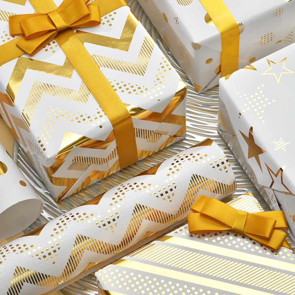 Directo de fábrica nuevo papel de embalaje dorado creativo estrella raya del punto papel de regalo de vacaciones