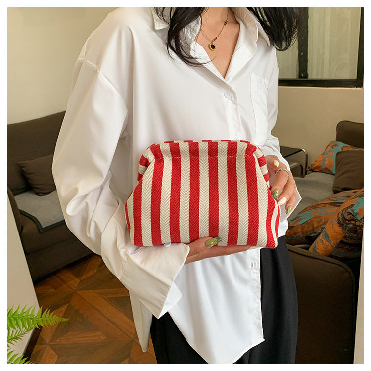 New cross-border fashion color-blocking striped cosmetic bag, women's loose change mobile phone storage bag, trendy and niche cloud clutch undefined