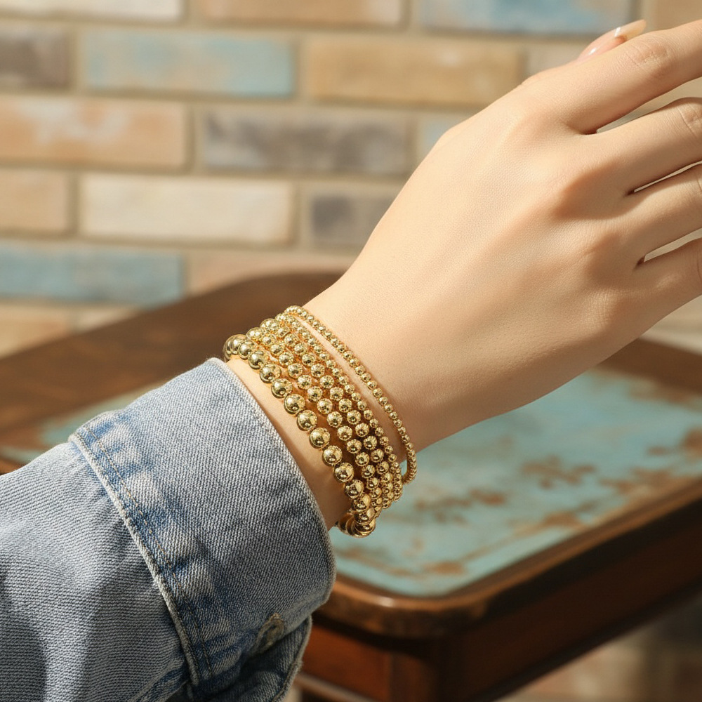 Pulsera elástica de cuentas chapadas en oro de 18 quilates, éxito de ventas transfronterizo en Europa y América, pulsera de cuentas de moda hip-hop personalizada de alta gama que conserva el color