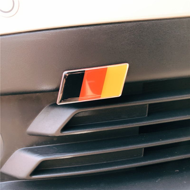 German, American, British, French Flags, Korean, Italian, Spanish, Russian Grille Center Logo