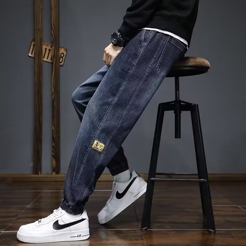 2024 primavera y otoño pantalones vaqueros de cintura elástica todo fósforo para hombres, pantalones de pierna ancha rectos sueltos para adolescentes de la calle principal