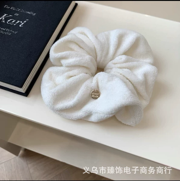White plush copper label