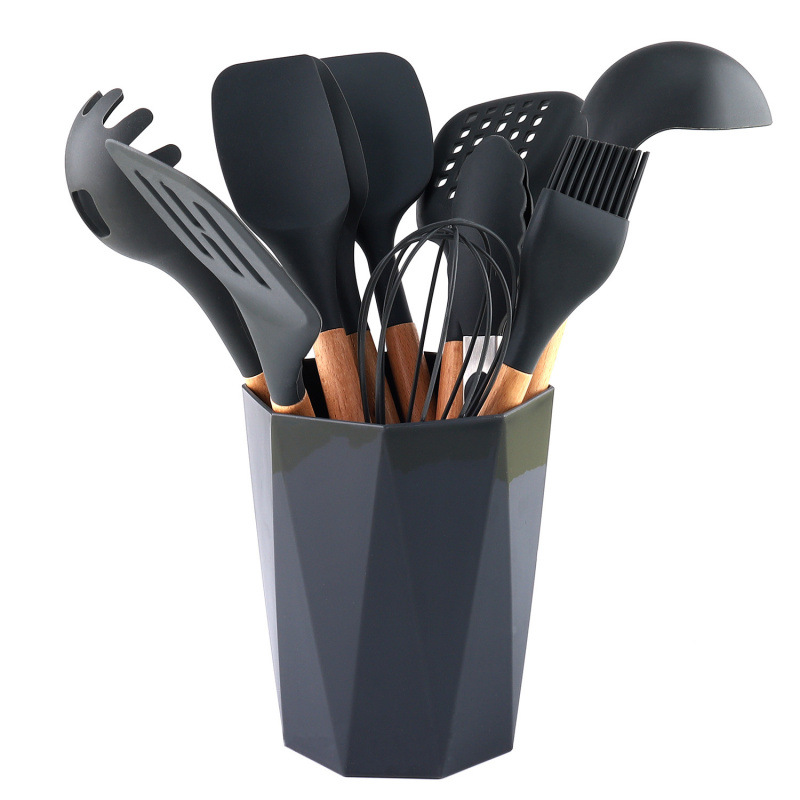 Nuevo conjunto de utensilios de cocina de silicona 11 piezas de mango de madera para el hogar, cocina de cocina frita con barril de almacenamiento