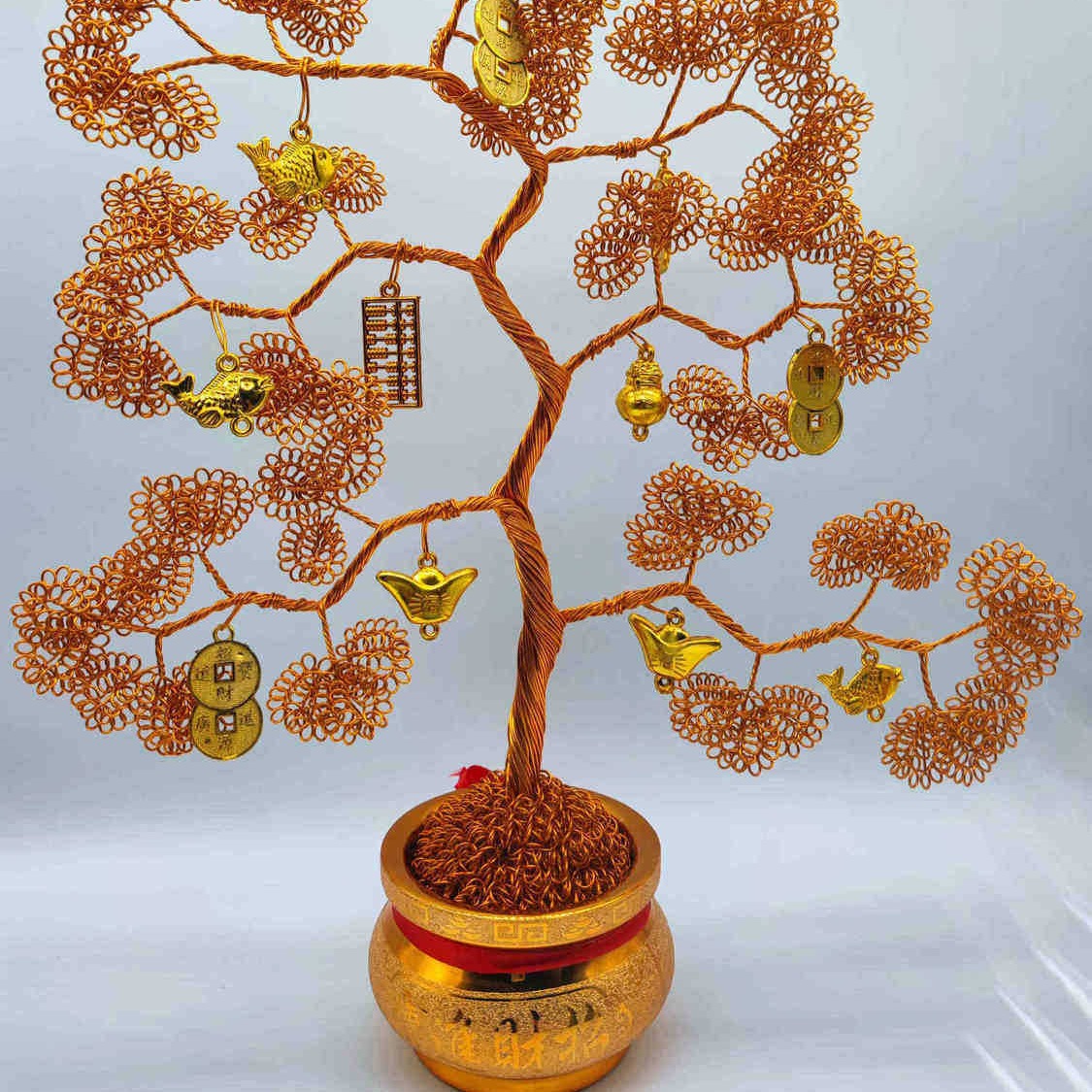 Handmade aluminum wire money tree ornament, a lucky charm for office decoration and a symbol of wealth and prosperity.