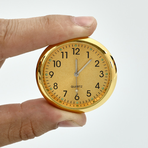 Supply glow-in-the-dark sun pattern car-mounted clock adhesive car clock quartz car clock