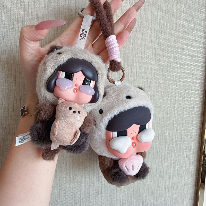New Third-Generation Crying Doll Sea Otter Earphone Case Shell Pendant Coffee Color Series Southeast Cross-Border Product Keychain Pendant Wholesale New Third-Generation Crying Doll Sea Otter Earphone Case Shell Pendant Coffee Color Series Southeast Cross-Border Product Keychain Pendant Wholesale