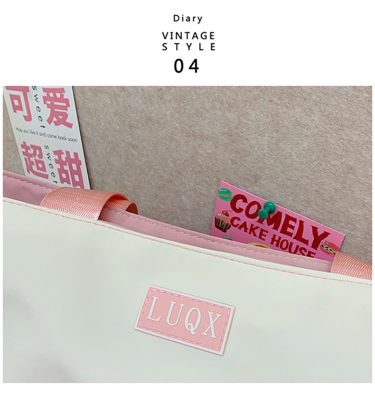 The new cute cartoon printed student bag with a large capacity and transparent student storage single-shoulder bag is selling well for women undefined