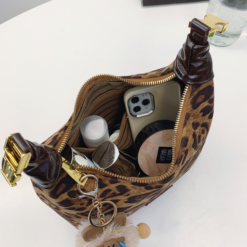 Otoño y invierno de moda nicho leopardo bolso para mujeres 2024 nuevo popular bolso de hombro amplio bolso de brazo