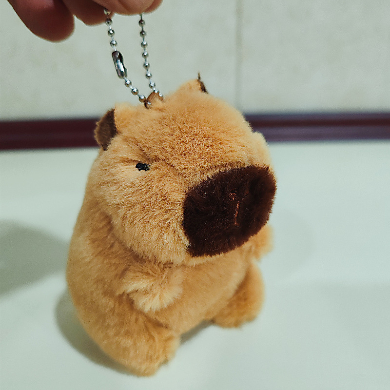 Pulsera de felpa con muñeca Kapibala musical, juguete de moda