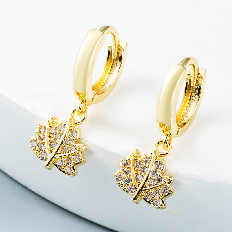 wholesale jewelry simple hollow sun leaves Virgin Mary copper earrings Nihaojewelrypicture4