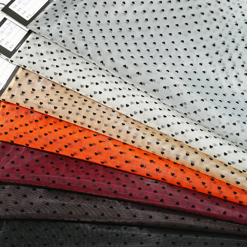 植绒爱心网纱面料无弹尼龙网桃心植绒面料新品纱裙连衣裙面料批发