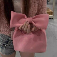 甘い妹の少女の粉の蝶結びのハンドバッグ2025新商品の春の装飾のハンドバッグはレジャーの大容量の雲の包みを包みます。