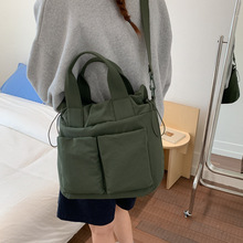 新款2025秋冬手提包女通勤包简约学院风学生单肩包纯色棉服斜挎包