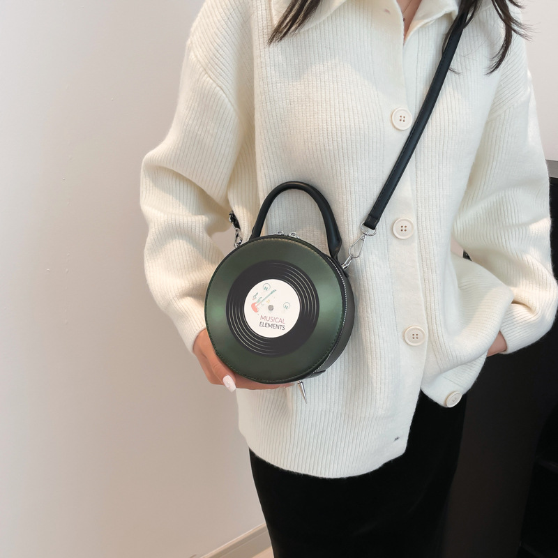 2025新款日系圆形包黑胶唱片包光盘手提单肩包复古街拍CD包