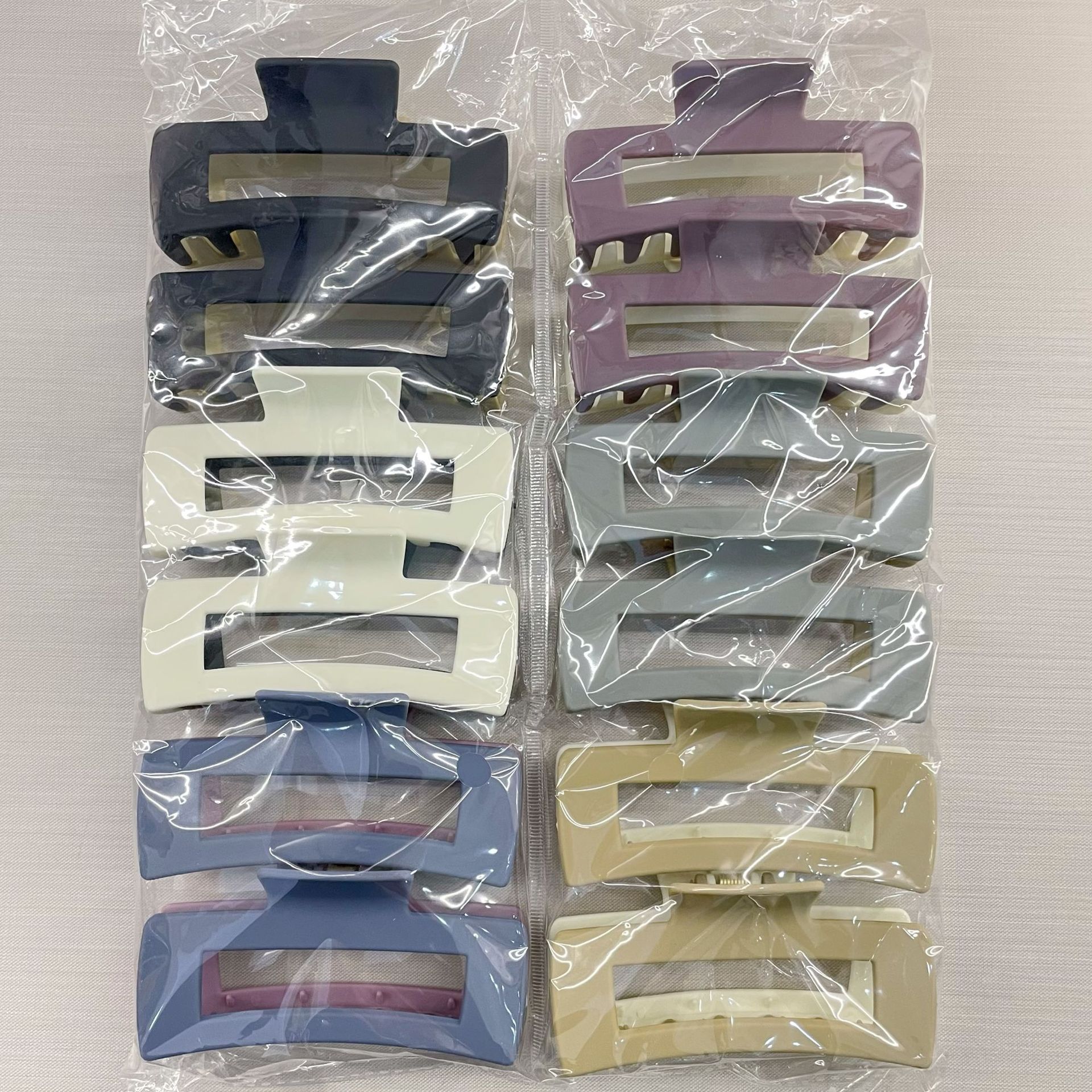 Oufeile superficie de dos colores AB textura esmerilada agarre cuchara trasera femenina alta Cola de Caballo tiburón clip accesorios para el cabello horquilla al por mayor