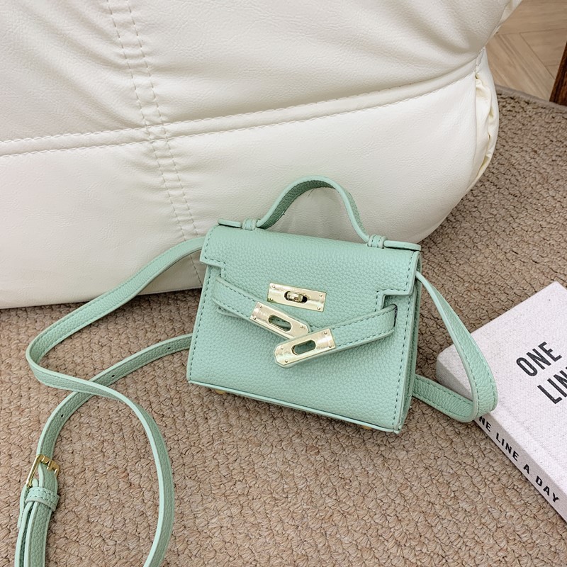 Bolso de hombro para niños y niñas de estilo coreano mini bolso de mensajero para padres e hijos de color sólido simple nuevo monedero con cerradura para niños