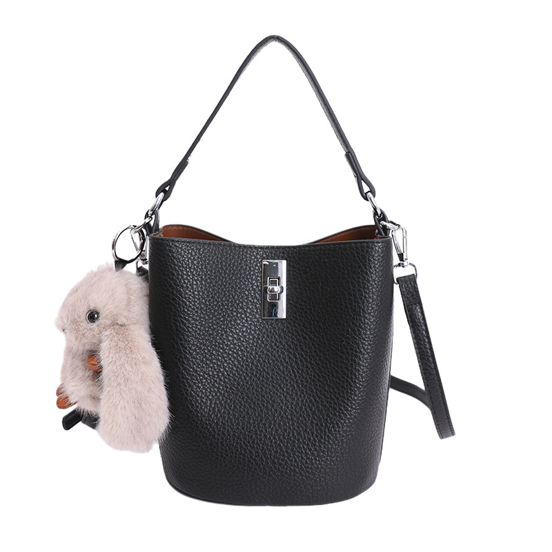 Bolso de nicho coreano portátil cubo de agua bolso para niños ventas calientes nueva textura de alta calidad lujoso ligero ocio versátil bolso de mochila