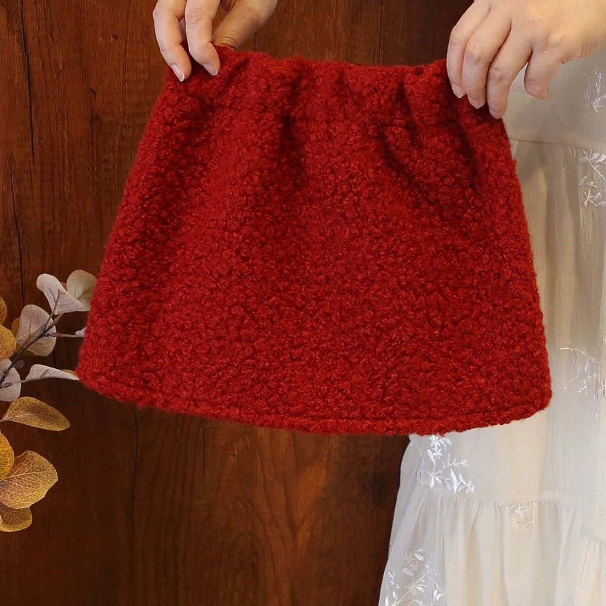Niñas 25 otoño y invierno engrosado estilo nacional en forma de una falda de busto de moda para mujeres tesoro de moda versátil anti-desvanecimiento falda corta roja de Año Nuevo