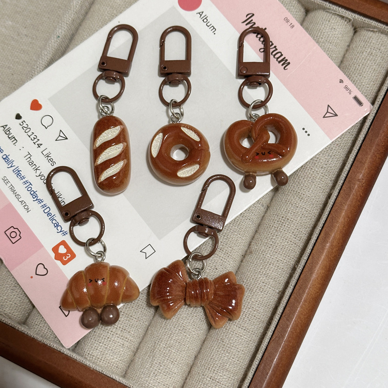 New Style Realistic Imitation Alkaline Water Bread Keychain, Fun Backpack Pendant, Gift for Classmates, Small Accessory Pendant Wholesale New Style Realistic Imitation Alkaline Water Bread Keychain, Fun Backpack Pendant, Gift for Classmates, Small Accessory Pendant Wholesale