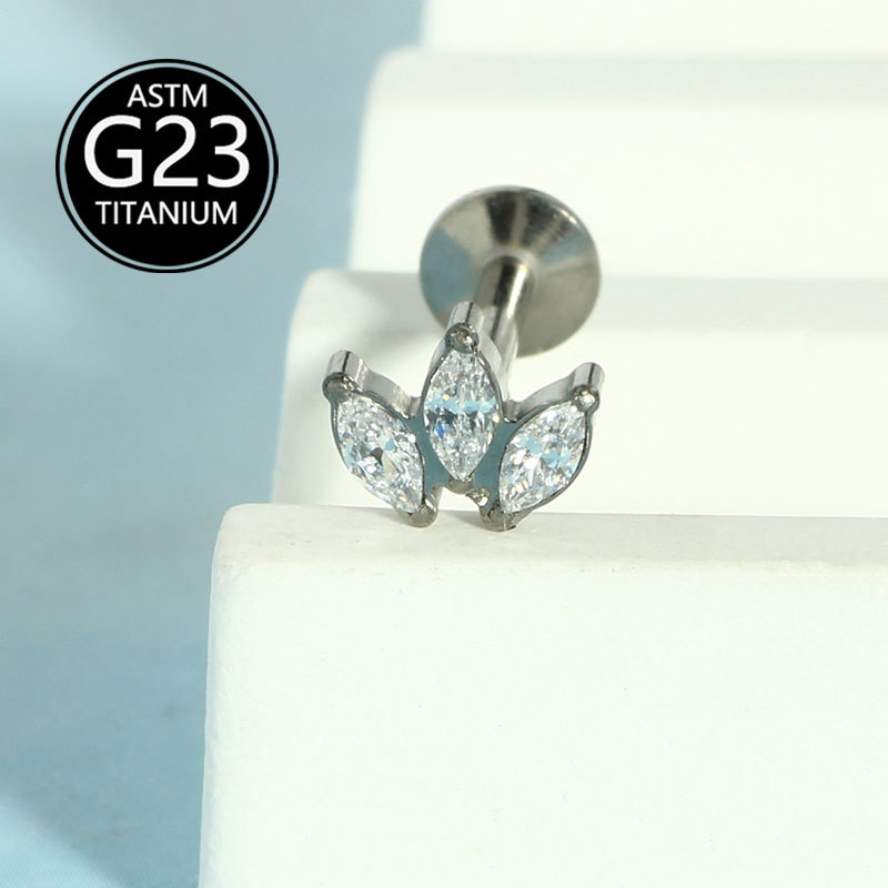 Silver pointed spike labret stud material detail