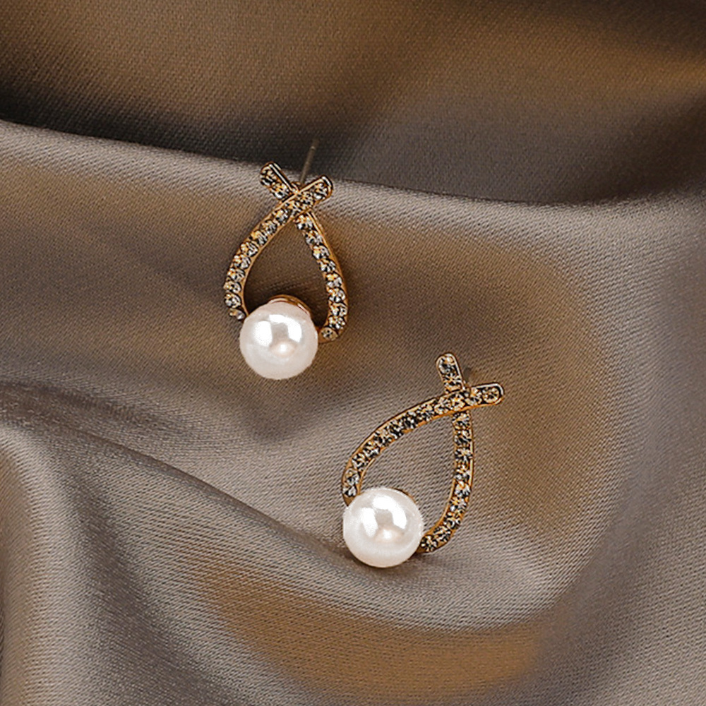 Aguja de plata de moda alta sensación de diamante de goteo de aceite pendientes nicho universal elegante pernos de orejas ligero lujoso temperamento simple orejas para mujeres