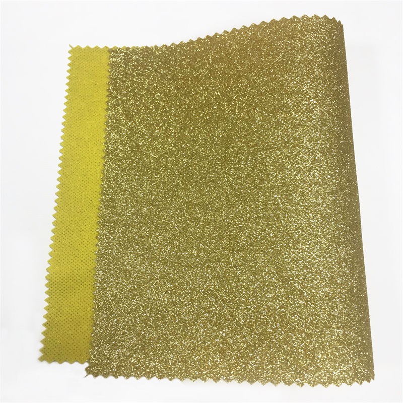 厂家直销金葱粉格利特皮革七彩无纺布底格利特 手袋箱包革料面料