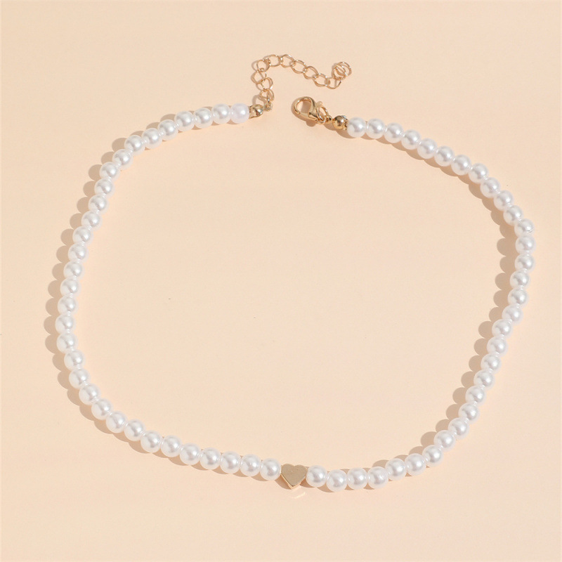 Collier élégant et raffiné, style Ins Style Niche Pearl, pour femme. Pendentif cœur ajouré, chaîne ras du cou légère et luxueuse._voghion.com