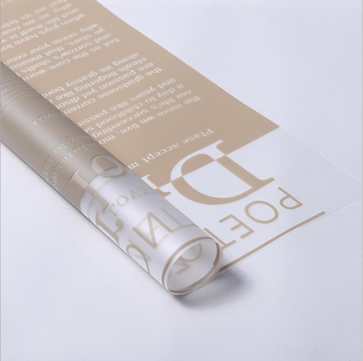 Fabricante de fiestas de flores al por mayor nuevo patrón de amor de San Valentín papel de embalaje de flores floristería translúcida ramo de flores