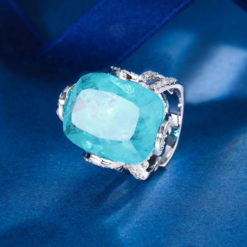 2024 nuevo estilo Zhuang Sheng joyería cobre inferior chapado en oro simulación color tesoro corindón grasa rectangular luz anillo de lujo hembra 15*25