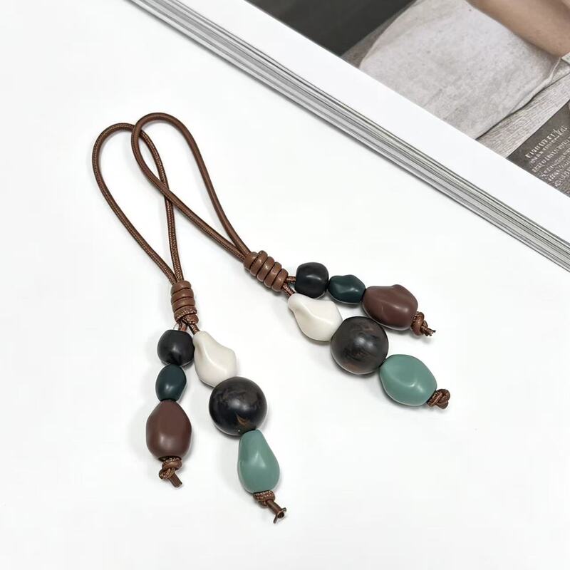 Cross-Border Wholesale of In-Stock Items Suitable for Longchamp Bag Charms, Longchamp Mini Dumpling Bag Ceramic Bead Pendants, and Bag Accessories Cross-Border Wholesale of In-Stock Items Suitable for Longchamp Bag Charms, Longchamp Mini Dumpling Bag Ceramic Bead Pendants, and Bag Accessories